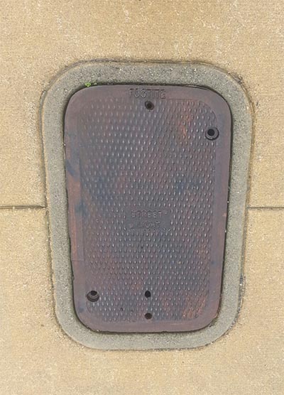 Junction boxes may be embedded in concrete, soil or grass.